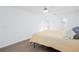 Comfortable bedroom featuring wood grain flooring, a ceiling fan, and a bed at 5050 Brownwood Dr, Powder Springs, GA 30127