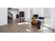 Bright and spacious home office with wood-look floors and a large window at 5050 Brownwood Dr, Powder Springs, GA 30127