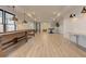 Finished basement with recreation area, recessed lighting and light colored wood floors at 114 Rock Creek Ln, Canton, GA 30114
