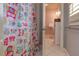 Bathroom with a colorful owl shower curtain, a vanity with towels, and a view into another part of the bathroom at 114 Rock Creek Ln, Canton, GA 30114