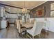 Dining room is open to the kitchen and has views of the backyard at 114 Rock Creek Ln, Canton, GA 30114