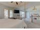 The main bedroom has a seating area and carpeted steps leading to the bedroom area at 114 Rock Creek Ln, Canton, GA 30114