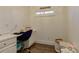 Cozy home office space with a modern desk and ample natural light at 114 Rock Creek Ln, Canton, GA 30114