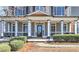 Charming front porch featuring classic columns, and space for seating at 114 Rock Creek Ln, Canton, GA 30114