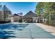 Community pool with a covered pavilion and a protective cover over the water at 2164 Caneridge Sw Dr, Marietta, GA 30064