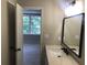 Bathroom featuring modern vanity and fixtures with ample natural light through the window at 2401 Northlake Ct, Atlanta, GA 30345