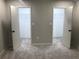 Bedroom with two closet doors on wall with carpeted floors at 2401 Northlake Ct, Atlanta, GA 30345