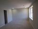 Spacious bedroom illuminated by recessed lighting, with neutral carpet and a window at 2401 Northlake Ct, Atlanta, GA 30345
