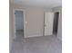Bedroom showcases neutral carpet and doorway to closet space at 2401 Northlake Ct, Atlanta, GA 30345