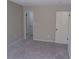 Neutral bedroom features neutral walls, neutral carpet and a closet at 2401 Northlake Ct, Atlanta, GA 30345