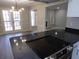 Kitchen bar with new flooring and a view of the living room at 2401 Northlake Ct, Atlanta, GA 30345