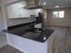 Open kitchen showcasing countertops, and views of the dining area at 2401 Northlake Ct, Atlanta, GA 30345