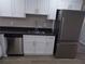 Kitchen area featuring stainless appliances, updated cabinets, sink and granite countertops at 2401 Northlake Ct, Atlanta, GA 30345