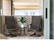 Relaxing balcony with comfortable seating and a small table, perfect for enjoying the outdoors at 2881 Peachtree Ne Rd # 702, Atlanta, GA 30305