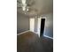 Bedroom with two closets, wall to wall carpet, and a ceiling fan at 405 Fairburn Sw Rd, Atlanta, GA 30331