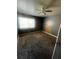 Bedroom with wall to wall carpet, one window, and a ceiling fan at 405 Fairburn Sw Rd, Atlanta, GA 30331