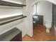 Tastefully designed bathroom with dark countertops, tile floor, and modern vanity at 5676 Kingsport Dr # 4, Atlanta, GA 30342
