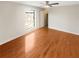 Spacious bedroom with a ceiling fan and hardwood floors at 5676 Kingsport Dr # 4, Atlanta, GA 30342