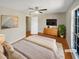 Cozy bedroom with a ceiling fan, natural light, and a calming ambiance at 5676 Kingsport Dr # 4, Atlanta, GA 30342