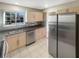 Bright kitchen featuring stainless steel appliances and a window over the sink at 5676 Kingsport Dr # 4, Atlanta, GA 30342