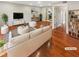 Bright living room boasts hardwood floors and neutral decor at 5676 Kingsport Dr # 4, Atlanta, GA 30342