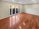 Bright living room features sliding glass doors to the exterior at 5676 Kingsport Dr # 4, Atlanta, GA 30342