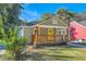 Charming single-story home with a welcoming front porch and well-manicured lawn at 1532 Pineview Sw Ter, Atlanta, GA 30311
