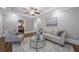 Bright living room with hardwood floors, recessed lighting, and a ceiling fan at 1532 Pineview Sw Ter, Atlanta, GA 30311
