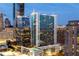 Exterior view of the building featuring modern design with floor-to-ceiling windows at 3324 Peachtree Ne Rd # 1115, Atlanta, GA 30326