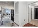 Hallway showcasing hardwood floors, an open floor plan, and a view of the living area and city skyline at 3324 Peachtree Ne Rd # 1115, Atlanta, GA 30326