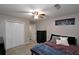 Spacious bedroom featuring a ceiling fan, soft carpet, and double door closet at 67 Mossy Oak Ln, Dallas, GA 30157