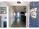 Welcoming foyer with wood floors leading into the living room at 67 Mossy Oak Ln, Dallas, GA 30157