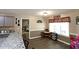 Eat-in kitchen with granite counters, stainless appliances, and adjacent breakfast nook at 67 Mossy Oak Ln, Dallas, GA 30157