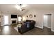 Open floor plan featuring fireplace and comfortable seating in the living room at 67 Mossy Oak Ln, Dallas, GA 30157