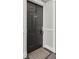 Unit front door with hardware, located in a residential building at 795 Hammond Dr # 1405, Atlanta, GA 30328