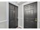 Apartment building hallway with doors to units, decorated with neutral paint and moldings at 795 Hammond Dr # 1405, Atlanta, GA 30328