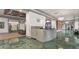 View of building lobby with concierge desk and upscale interior design features at 795 Hammond Dr # 1405, Atlanta, GA 30328