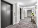Hallway with elevator access featuring contemporary decor at 795 Hammond Dr # 1405, Atlanta, GA 30328