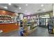 Shot of convenience market with stocked shelves, refrigerated beverages, and snack foods at 795 Hammond Dr # 1405, Atlanta, GA 30328