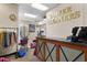 Clean reception area with counter, laundry racks, and signage for Tower Cleaners at 795 Hammond Dr # 1405, Atlanta, GA 30328