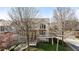 Townhome's facade showing balconies, a two-story brick exterior and trees at 1354 Fernwood Ne Cir, Brookhaven, GA 30319