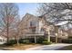 Exterior shot of home showing the balcony with an awning at 1354 Fernwood Ne Cir, Brookhaven, GA 30319