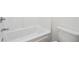 Clean bathroom with a white tub and toilet at 5932 Vinings Vintage Way, Mableton, GA 30126
