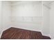 Walk-in closet with wire shelving and durable wood-look flooring at 5932 Vinings Vintage Way, Mableton, GA 30126