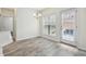 Cozy dining area with tiled floors and a door leading to the backyard at 5932 Vinings Vintage Way, Mableton, GA 30126