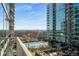 View of pool and city from balcony at 943 Peachtree Ne St # 1108, Atlanta, GA 30309