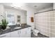 Bathroom with granite countertop, modern fixtures, and a shower-tub combination at 943 Peachtree Ne St # 1108, Atlanta, GA 30309