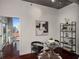 Cozy dining nook featuring modern decor, hardwood flooring, and stylish shelving for added charm at 943 Peachtree Ne St # 1108, Atlanta, GA 30309