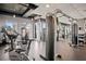 Well-equipped fitness center with modern exercise machines and ample natural light at 943 Peachtree Ne St # 1108, Atlanta, GA 30309