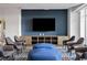 Modern lounge area with comfortable seating and a large TV for entertainment at 943 Peachtree Ne St # 1108, Atlanta, GA 30309